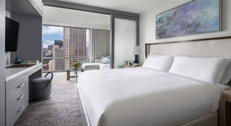 Image of a single bed in a City/Ocean-View Corner Room.