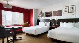 Image of a two beds in a Park MGM Restore Room.