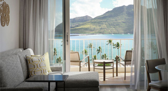 View of balcony with ocean and mountain from inside Preferred Ocean-View Room