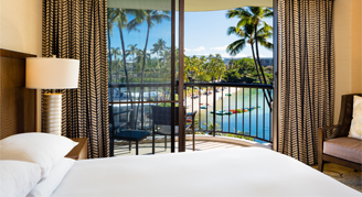 Image of a single bed in a Makai Ocean-View Room.