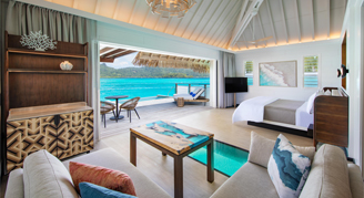 Image of a single bed leading to  a Two-Bedroom Royal Otemanu-View Overwater Villa with Plunge Pool.