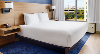 Image of a single bed in a Room.