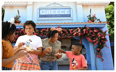 A view of travelers enjoying treats together.