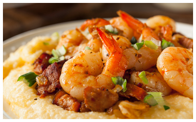 Close up image of a bowl of shrimp and grits