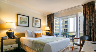 Image of a single bed in a Two-Bedroom Partial-Ocean-View.