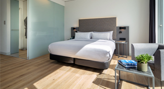 Photo of hotel bedroom.