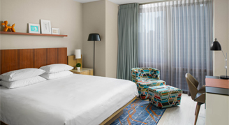 Image of a single bed in a Room.