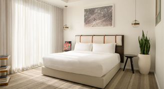 Interior view of the Executive Suite with a king bed.