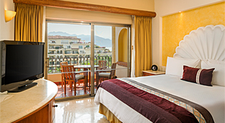 Image of a single bed in a One-Bedroom Deluxe Suite.