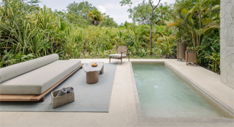 Image of an outdoor plunge pool and adjacent seating area.