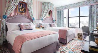 Graduate Room featuring two queens beds.