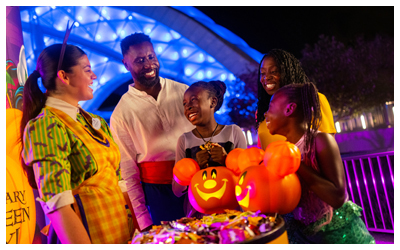  a family participating in Mickey's Not-So-Scary Halloween Party