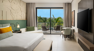 Photo of Club Azure Tropical-View Room with one king bed.