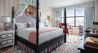 Graduate Room featuring one king bed and an accessible shower.