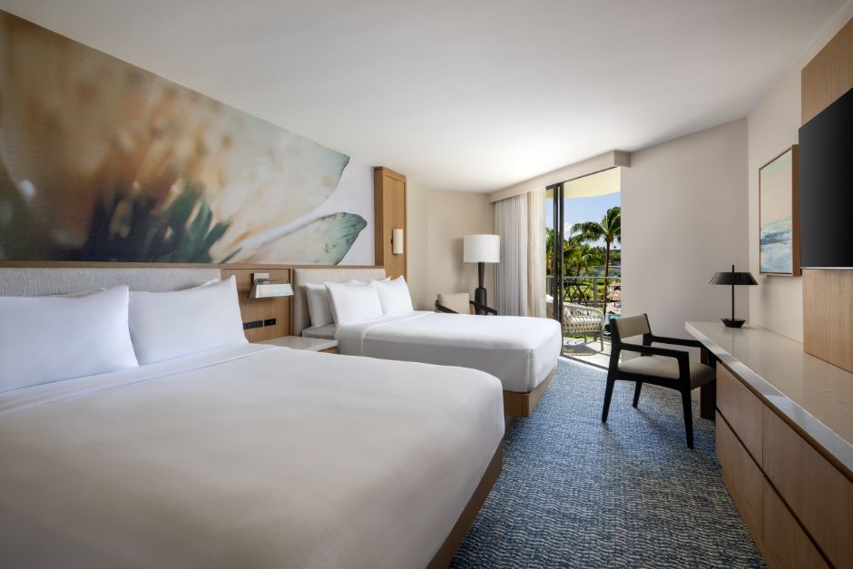 Photo of hotel room with two queen beds.