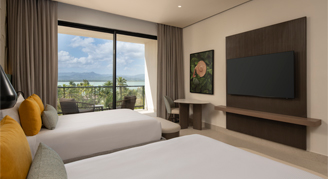 Photo of Club Azure Ocean-View room with two queen beds.