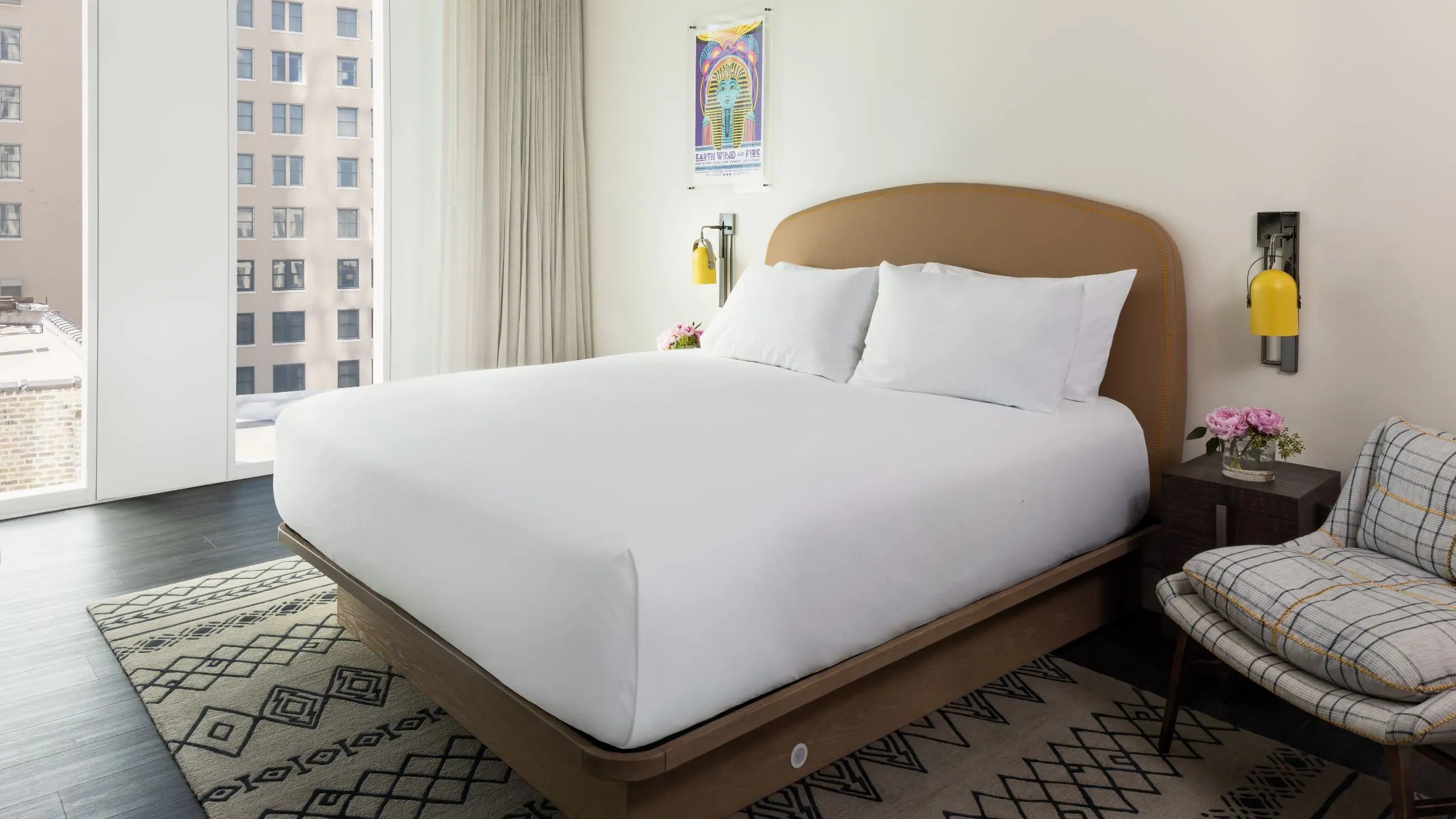 Photo of hotel room with one king bed.