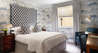 Image of a single bed in a Cozy Double Room.