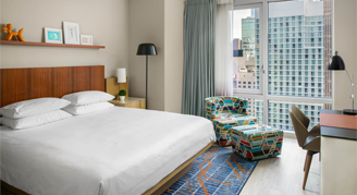 Image of a single bed in a High-Floor City-View Room.