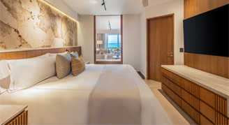 Image of one bed in a Parlor Ocean-View Suite.