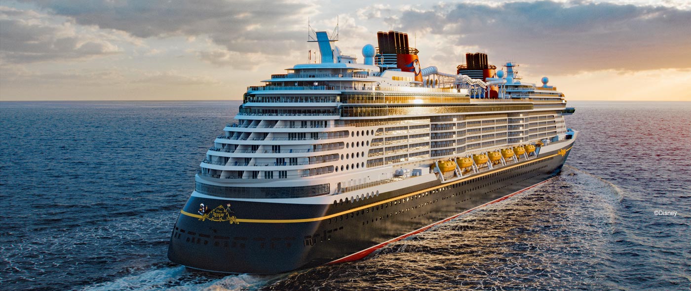 Image of the Disney Treasure sailing towards the sunrise.