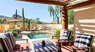 Deluxe One-Bedroom Suite with Pool patio area