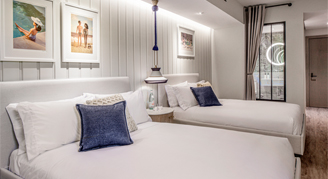 Image of two beds in a Standard Room.