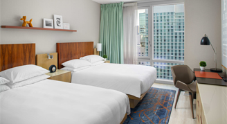 Image of two beds in a City-View Room.