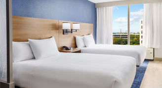 Image of two beds in a High-Floor Room.