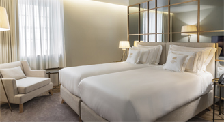 Image of two beds in a Premium Room.