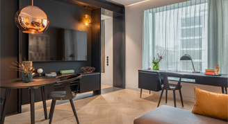 Image of the sitting area and windows of the Residence Suite.