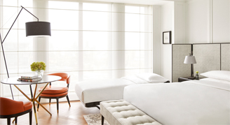 Image of a bed and rollaway bed in a High-Floor Room.