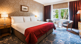 Image of a single bed in a Patio Room.