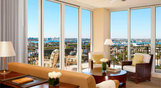 Image of the seating area in a Two-Bedroom Intercoastal-View Room at Palm Beach Marriott Singer Island Beach Resort & Spa.
