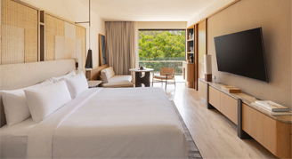 Image of a single bed in an Ocean-View Room.