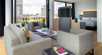 Photo of the Triple Loft living space and bedroom.