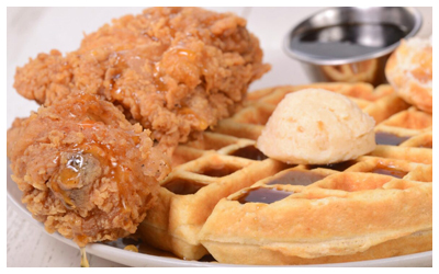A plate of fried chicken and waffles.